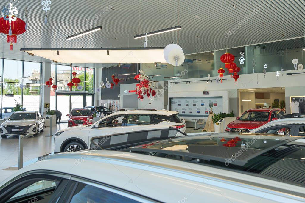 Almaty, Kazakhstan - May 29, 2025: Chery cars inside the showroom. Chinese automobile manufacturing company