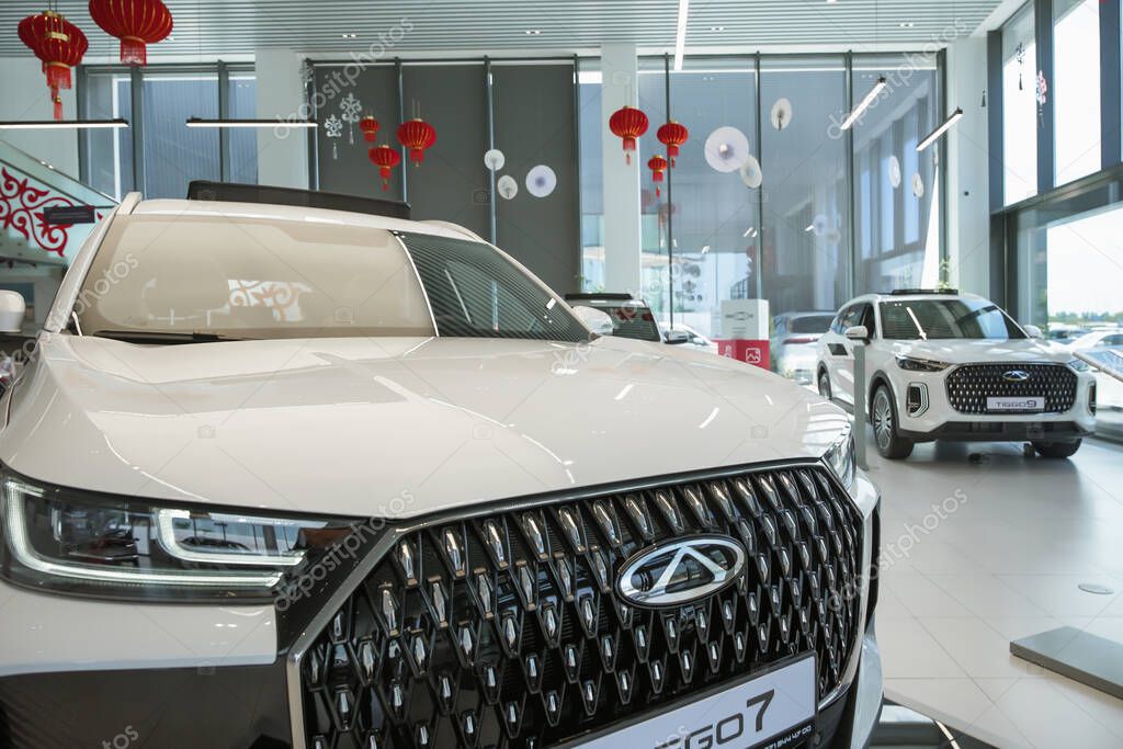 Almaty, Kazakhstan - May 29, 2025: In front of Chery Tiggo 7 in the showroom. Chinese automobile manufacturing company