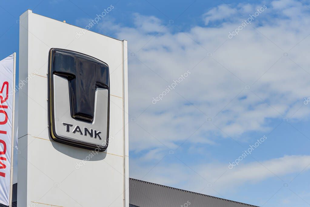 Almaty, Kazakhstan - May 29, 2025: Tank emblem near a car dealership against the sky. Chinese automobile brand. A division of Great Wall Motor