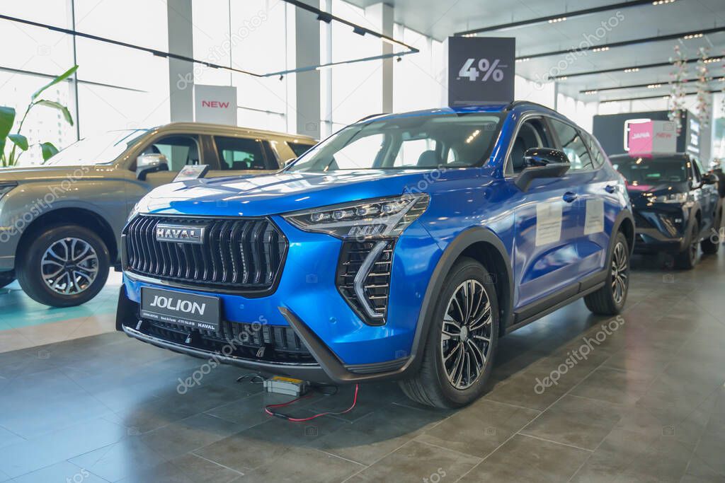 Almaty, Kazakhstan - May 29, 2025: Blue Haval Jolion in the showroom. Chinese car brand