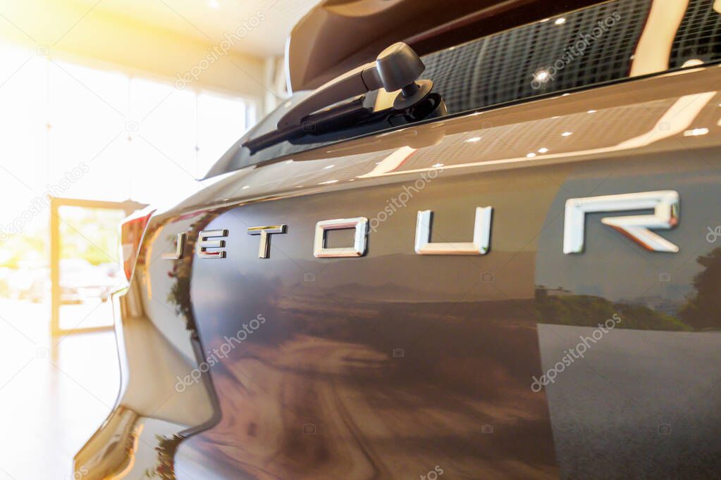 Almaty, Kazakhstan - June 11, 2025: Jetour emblem on the rear trunk of the car. Chinese automaker