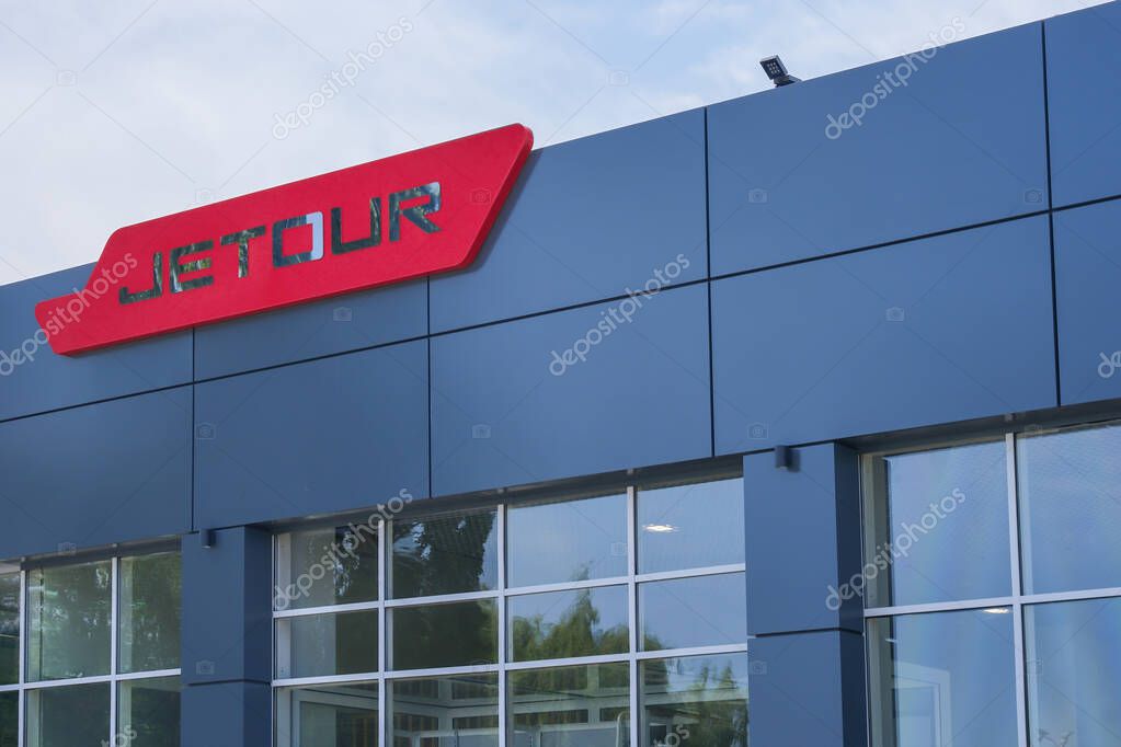 Almaty, Kazakhstan - June 11, 2025: Jetour car brand logo on the building facade. Chinese automaker