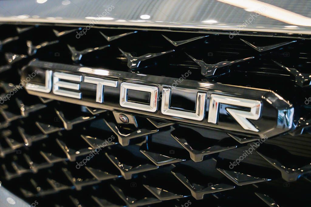 Almaty, Kazakhstan - June 11, 2025: Jetour logo on front grille. Chinese automaker