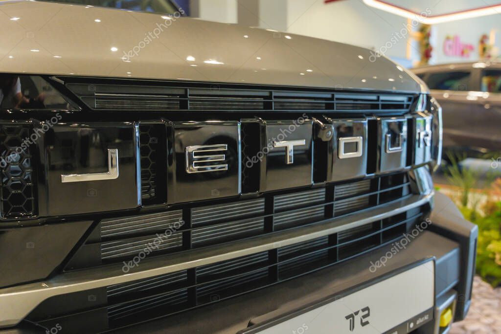 Almaty, Kazakhstan - June 11, 2025: Jetour emblem on the front grill. Chinese automaker