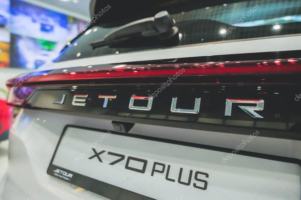 Almaty, Kazakhstan - June 11, 2025: Jetour emblem on the rear trunk of a white car. Chinese automaker