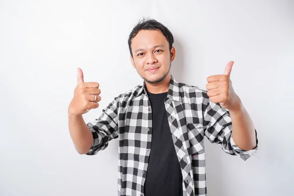 Excited Asian Man Wearing Tartan Shirt Gives Thumbs Hand Gesture — Stock Photo, Image