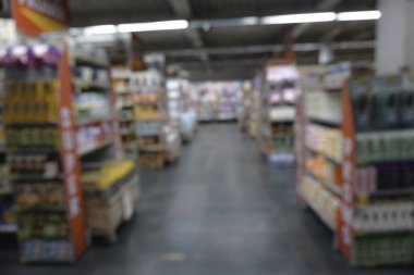 Abstract blurred of alley interior in a market, with bokeh light background.