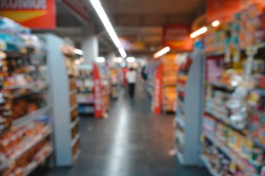 Abstract blurred of alley interior in a market, with bokeh light background.