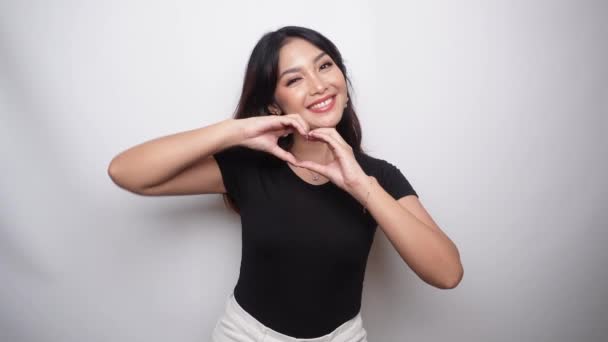 Asian Beautiful Smiling Girl Showing Love Sign Hand Isolated White — 비디오