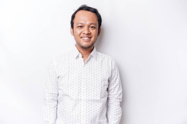 A portrait of a smiling Asian man wearing a white shirt, isolated by white background