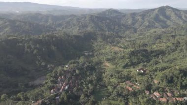 Aerial view of traditional village in the middle of forest in Indonesia