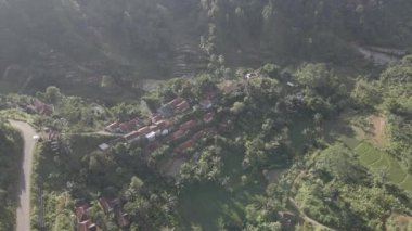 Aerial view of traditional village in the middle of forest in Indonesia