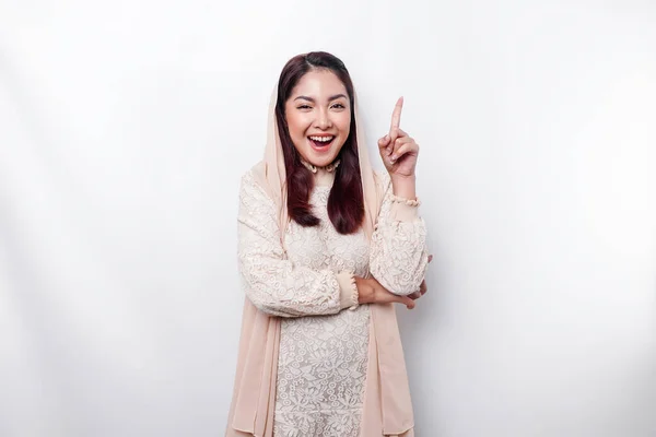 Excited Asian Muslim Woman Wearing Hijab Pointing Copy Space Her — Stok fotoğraf