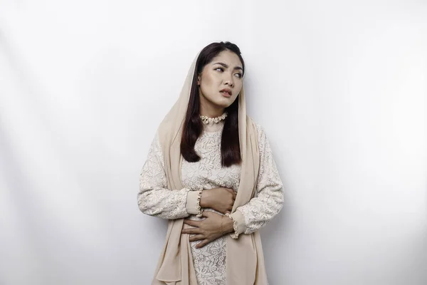 Asian Muslim Woman Fasting Hungry Touching Her Belly While Looking — 스톡 사진