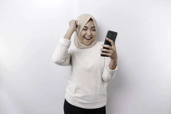 Young Asian Muslim Woman Happy Successful Expression Wearing Hijab Holding — Zdjęcie stockowe