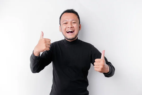 Excited Asian Man Wearing Black Shirt Gives Thumbs Hand Gesture — Stock Photo, Image