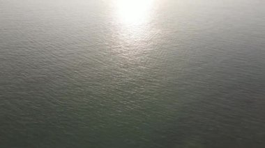 Karimunjawa, Jepara, Endonezya 'da okyanusta gün batımı manzarası