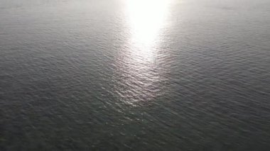 Karimunjawa, Jepara, Endonezya 'da okyanusta gün batımı manzarası