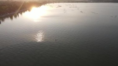 Karimunjawa, Jepara, Endonezya 'da okyanusta gün batımı manzarası