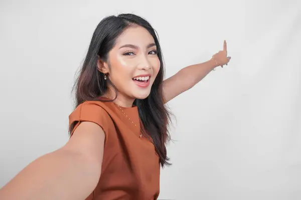 Smiling Young Asian Woman Brown Shirt Doing Video Call Pose Stok Foto