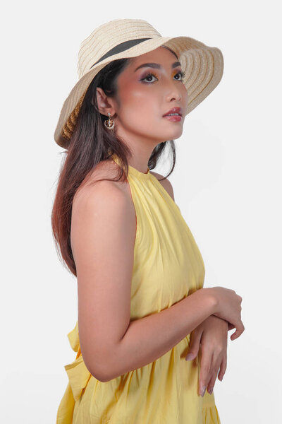 Young Asian Woman Yellow Dress Wearing Straw Hat Looking Distance Royalty Free Stock Images