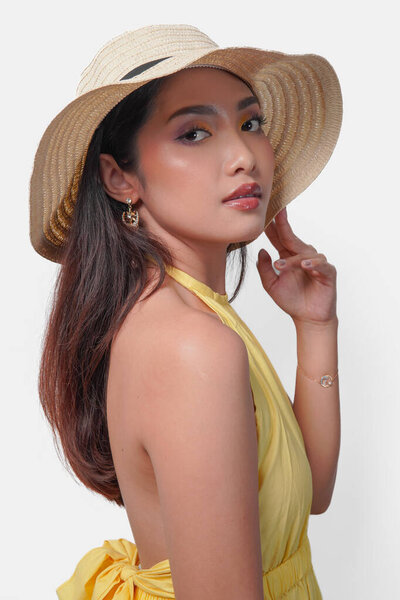 Young Asian Woman Yellow Dress Wearing Straw Hat Looking Distance Royalty Free Stock Images