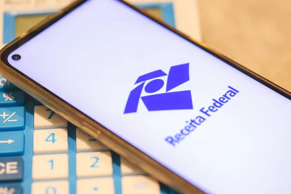 stock image Brasilia, Federal district, Brazil: Receita Federal (Brazilian Federal Revenue Department) app on the smartphone screen