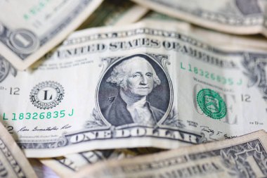 Para geçmişini dolar banknotlarıyla kapatın. Ekonomi ve finans kavramı.