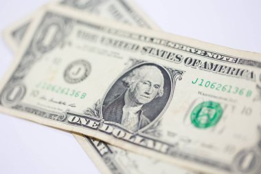 Para geçmişini dolar banknotlarıyla kapatın. Ekonomi ve finans kavramı.