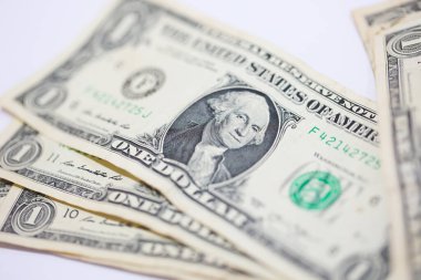 Para geçmişini dolar banknotlarıyla kapatın. Ekonomi ve finans kavramı.