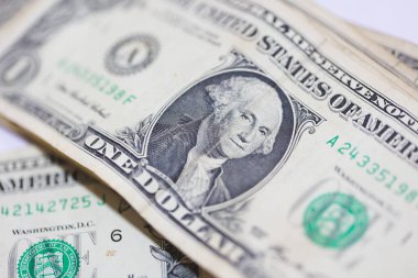 Para geçmişini dolar banknotlarıyla kapatın. Ekonomi ve finans kavramı.