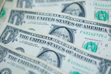 Para geçmişini dolar banknotlarıyla kapatın. Ekonomi ve finans kavramı.