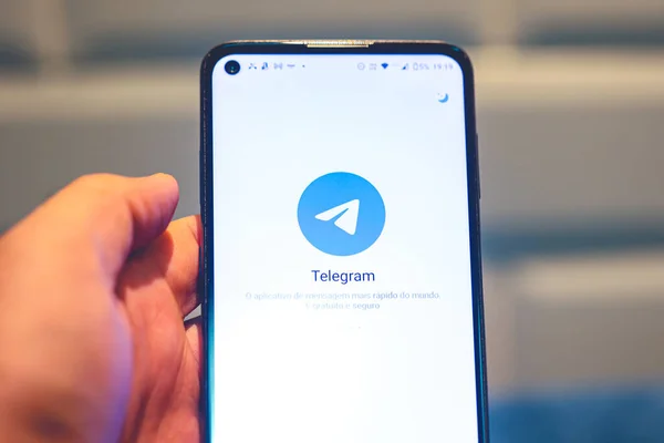 stock image Brasilia, Federal District, Brazil - April, 2023. Telegram app logo on a smartphone screen