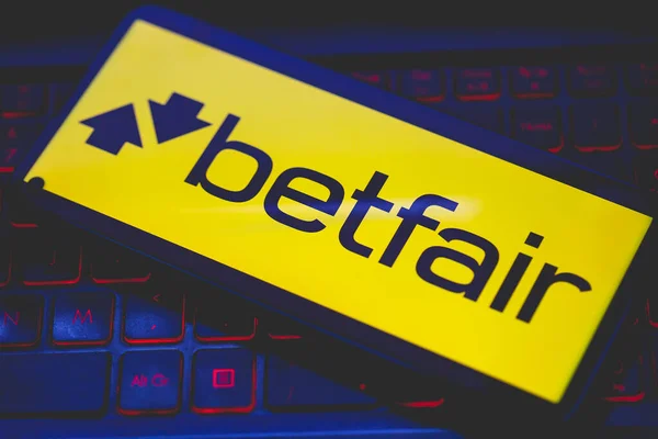 stock image Brasilia, Federal District, Brazil - April, 2023. Betfair app logo on a smartphone screen