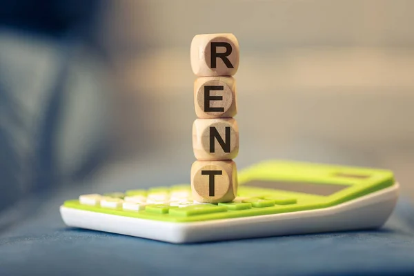 Word Rent Written Wooden Cubes Calculator Composition Close — Stock Photo, Image