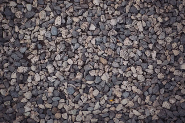 灰色の石の質感 自然な背景 小さな道路石の背景 砂利小石の石のテクスチャ 花崗岩 大理石 地面の小石 小さな岩の質感 — ストック写真