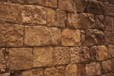 Güzel desenli, kuru taş bir duvarın yakın çekimi. Modern Biçim Tasarım Dekoratif Dekoratif Dekoratif Yapı İçin Çimento Yapımı İçin Çimento Kullanılan Gerçek Taş Duvar Yüzeyi Desenli Vinor Deseni.