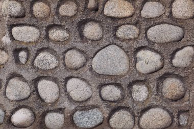 Doğal taş duvar dokusu. Kusursuz bir doku. Her tarafı mükemmel döşenmiş. Taş bir duvarın dokusu. Eski kale taşından duvar dokusu. Arka plan ya da doku olarak taş duvar. Taş bir duvarın parçası