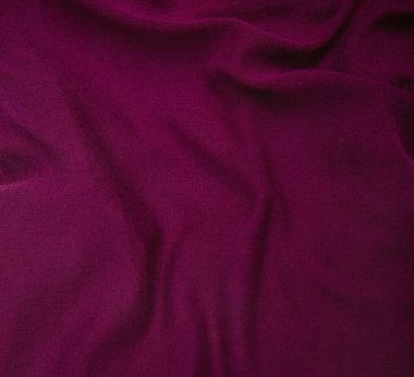 Mağaza için elbise dikmek için kullanılan buruşuk koyu mavi kumaş. Arka plan olarak tekstil kumaş polyester, örgü ya da pamuk kumaş dokusu. Örneklerin katalog fotoğrafı. 