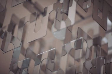 Şeffaf şekillerin karmaşık bir düzeni ışık ve gölgenin dinamik etkileşimini yaratır. Tasarım derinlik hissi uyandırıyor, daha yakından inceleme ve teftişe davet ediyor.