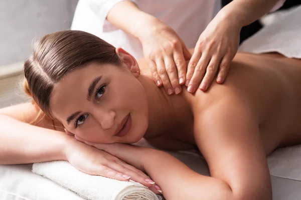 Masseur Massaging Back Shoulder Blades Young Woman Smiling Massage Table — 스톡 사진