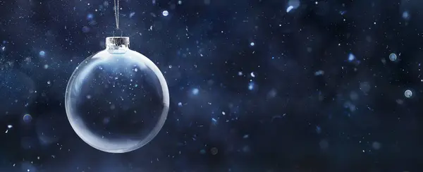 夏娃夜的雪球 具有抽象背景的愿望概念 图库图片
