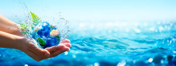 Ocean Environment Concept Hands Holding Globe Glass Blue Sea Defocused รูปภาพสต็อก