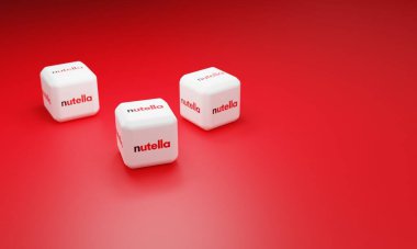 Melitopol, Ukrayna - 21 Kasım 2022: Nutella logosu renk arkaplanında izole edildi. Nutella, İtalyan Ferrero firması tarafından 1964 yılında üretilmiştir..