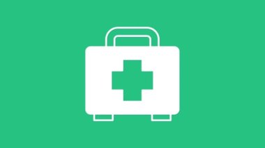 Yeşil arkaplanda beyaz ilk yardım çantası simgesi izole edildi. Haçlı sağlık kutusu. Acil durumlar için tıbbi ekipman. Sağlık sigortası konsepti. 4K Video hareketli grafik canlandırması.