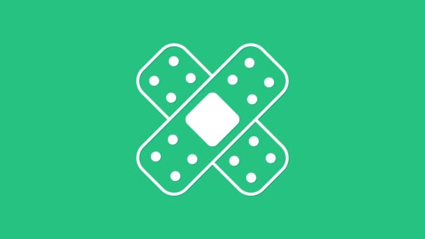 Weißes Kreuzbandpflaster Symbol Isoliert Auf Grünem Hintergrund Medizinischer Gips Klebeverband — Stockvideo