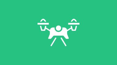 Beyaz İHA uçan ikonu yeşil arka planda izole edildi. Video ve fotoğraf makinesi sembollü dörtlü helikopter. 4K Video hareketli grafik canlandırması.