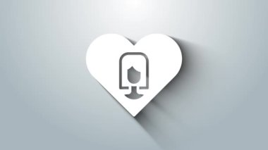 Gri arka planda kadın ikonu olan beyaz kalp. Venüs sembolü. Bir kadın ya da organizmanın sembolü. 4K Video hareketli grafik canlandırması.