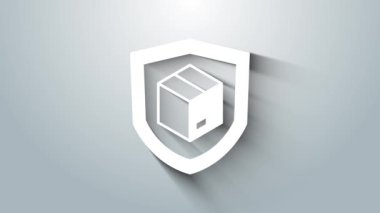 Gri arkaplanda kalkan simgesi olan beyaz teslimat güvenliği. Teslimat sigortası. Kalkanın ötesinde sigorta kutuları var. 4K Video hareketli grafik canlandırması.