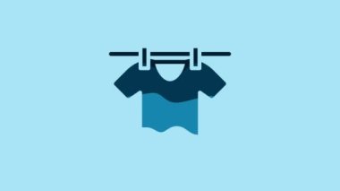 Blue Drying clothes icon isolated on blue background. Clean shirt. Wash clothes on a rope with clothespins. Clothing care and tidiness. 4K Video motion graphic animation .